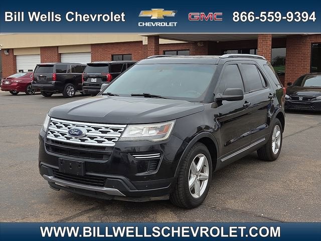 2019 Ford Explorer XLT in Black — front three-quarter view