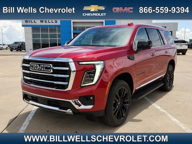 2026 GMC Yukon Elevation in Volcanic Red Tintcoat — front three-quarter view