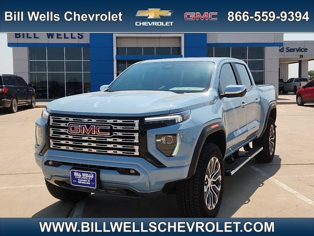 2026 GMC Canyon Denali in Glacier Metallic — front three-quarter view