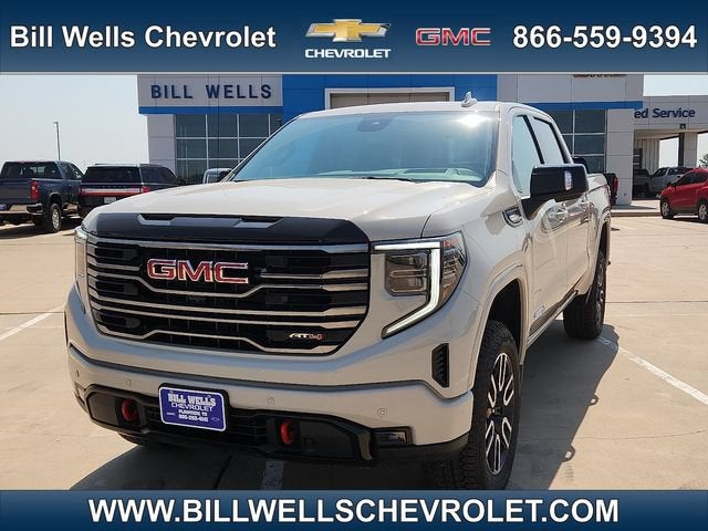 2026 GMC Sierra 1500 AT4 in Coastal Dune — front three-quarter view